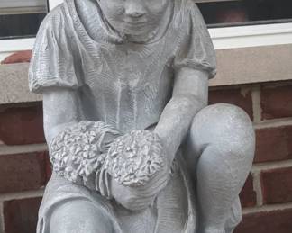Cement girl statue