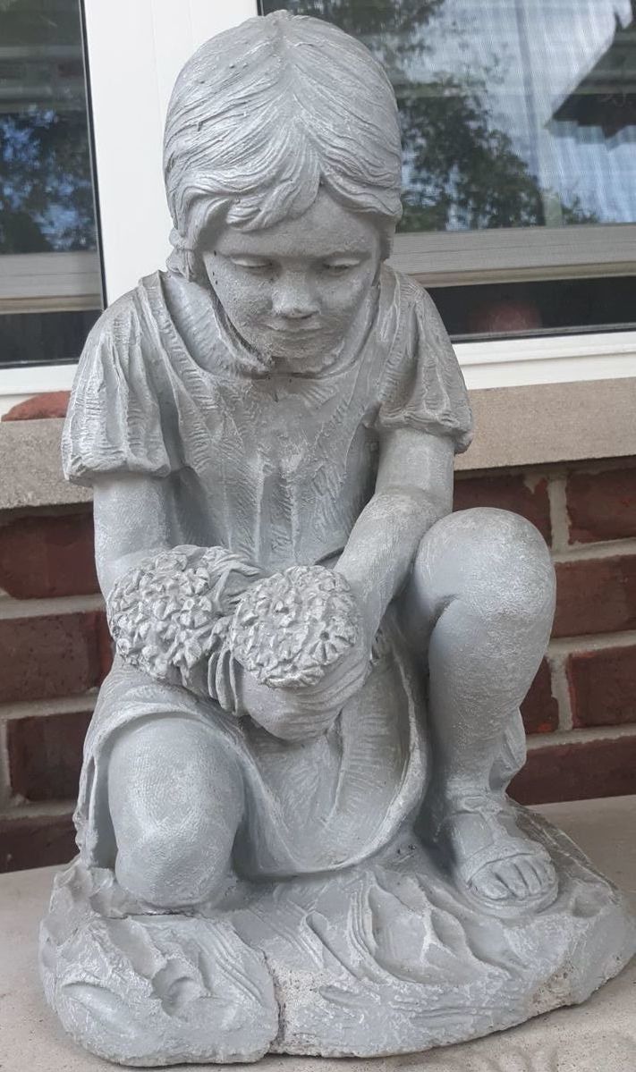 Cement girl statue