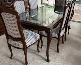 NOW $395. $895.00. Circa 1980’s solid walnut wood glass top EXCELLENT CONDITION. 6 upholstered Chairs excellent condition.   Century Furniture Very Expensive top of the line in the 80s.
72” x 42” x 29” high. 