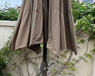  SUNBRELLA umbrella and stand.
