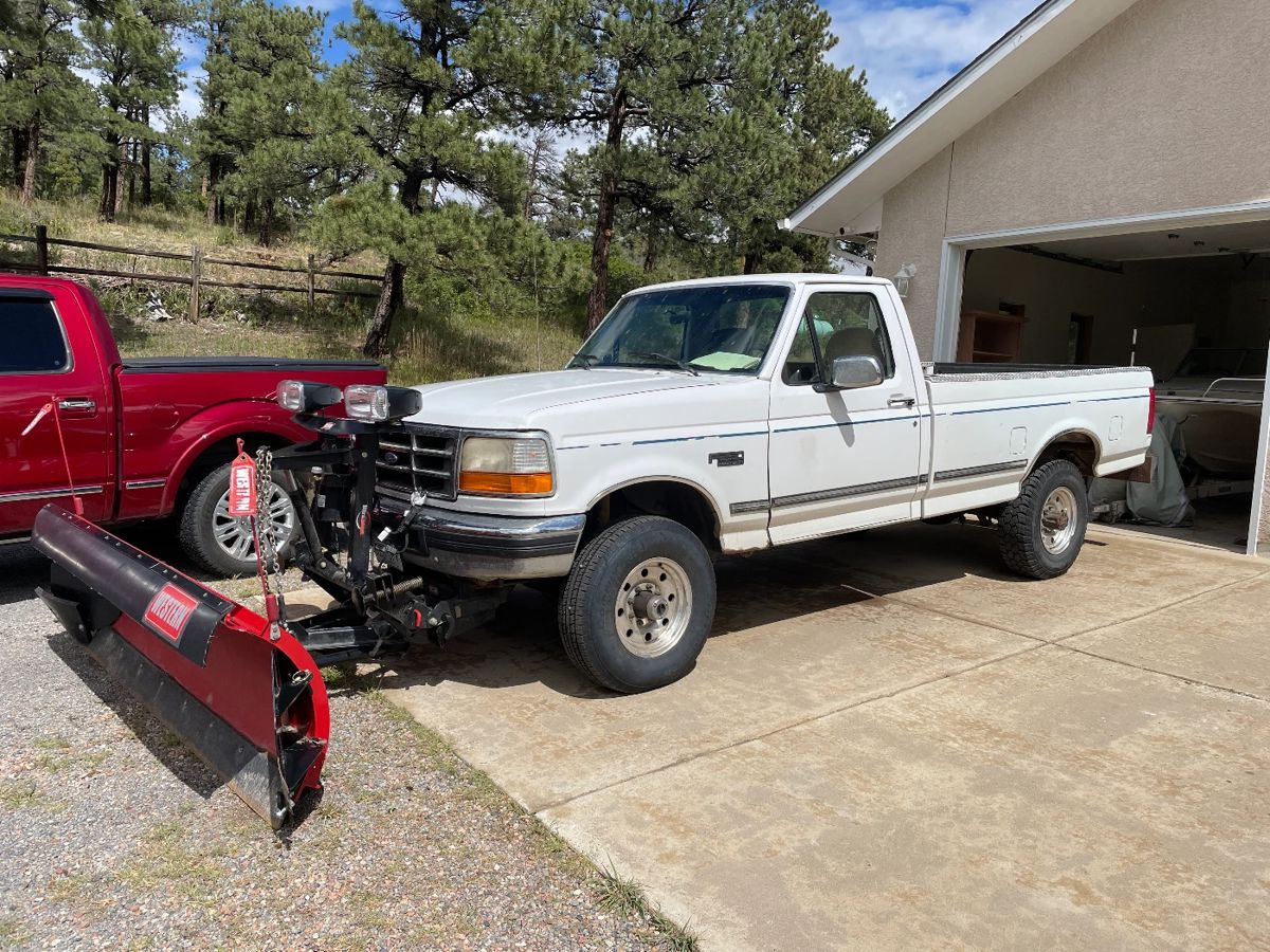97 F250 4x4 w/plow. Runs great.