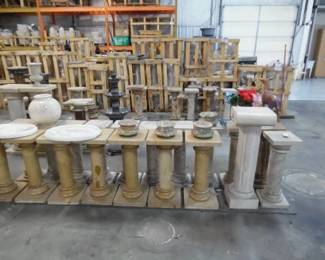 Various sizes of plant stands and fountains