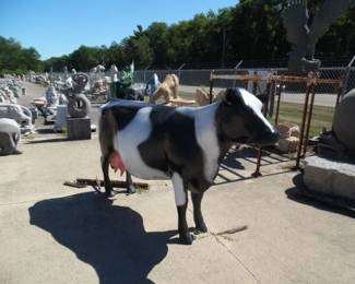 MOOOO. Who wants this beautiful hand painted cow for their dairy