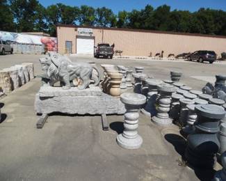 Large beautiful lion and lots of pedestal stands