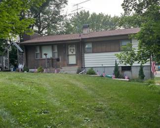 3 BDRM house also for sale: Large stone working wood burning fireplace, hardwood floors, newer energy efficient gas furnace, new gas hot water heater, newer electrical breakers with 220, maintenance free siding. Heated basement & garage. All on private lot with mature &  peach trees, private semi-enclosed patio, garden,  new landscaping plus beautiful views of Rock River and  wildlife. 
A nice place with that country feeling! Many residents ride their golf carts in town for fun with their family or alone too.