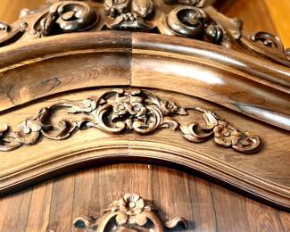 French carving on antique wardrobe 