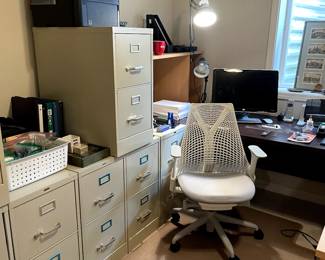 Several 2-drawer file cabinets