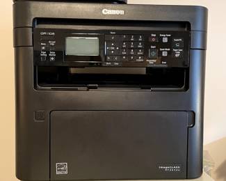 Canon Laser Printer-like new with driver disc