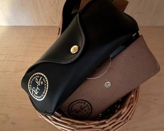 Ray Ban sunglasses. One pair is brand new with tags.