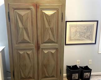 Solid wood armoire. Framed map of Boston.
