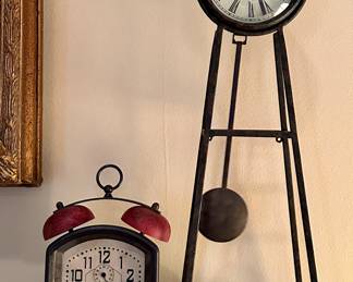 Pottery Barn Clock (left) & Infinity Clock (right)