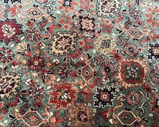 8x10 wool rug (green, burgundy and orange colors)