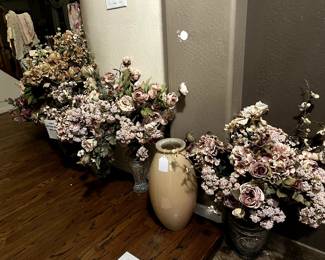 Floral arrangements all in Crystal vases