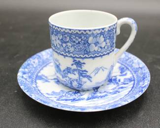 Blue and White Teacup & Saucer w/Mountains and Floral Motif
