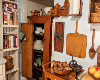 Picture includes..
Pine storage cabinet
Hand carved fruit
1898 apple peeler
Bread boards