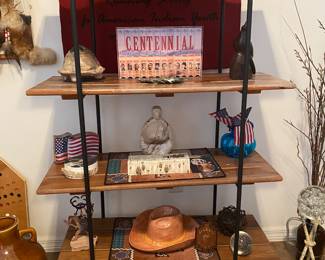 Rustic industrial shelving unit. 
Solid wood shelves with hand forged slat posts  35.75 W x 53 H x 15 D