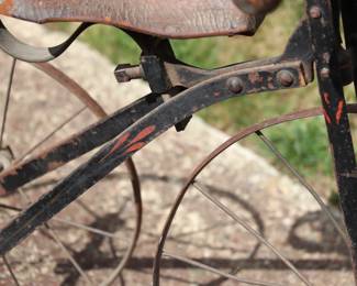 Antique Victorian Tricycle with Decorated Metal Frame and Original Leather Seat