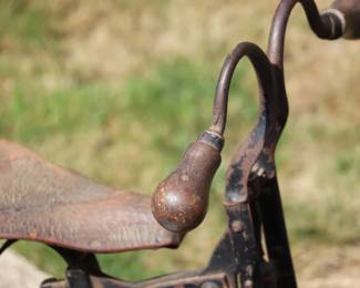 Antique Victorian Tricycle with Decorated Metal Frame and Original Leather Seat