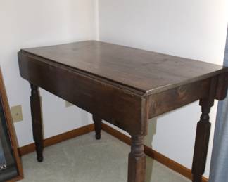 Primitive drop leaf table