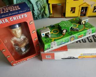 Peoria Chiefs bobble head, wind up car race, with box. Works