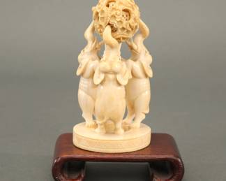Carved bone Asian statue