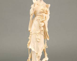Carved bone Asian statue