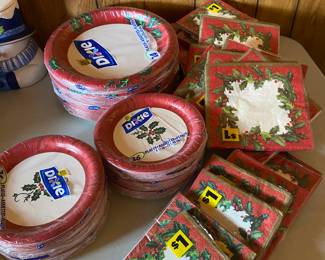 Lots of unused holiday napkins and plates available. 