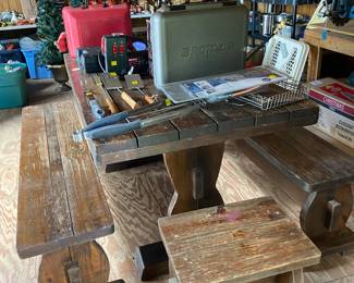 Nice handmade table and 4 benches. Would be awesome refinished. .