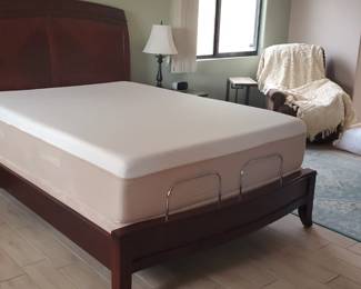 Queen sized massaging mattress. New, never used. Sleigh bed frame. Sold as a set.