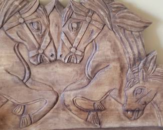 Upclose description of hand carved bench