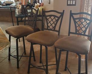 3 Swivel and padded bar stool