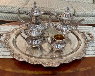 close up of silverplated tea set with tray