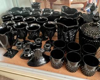 several pieces of black glass