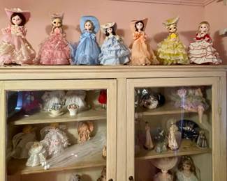 lots of collectible dolls