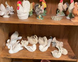roosters, chicken and swans
