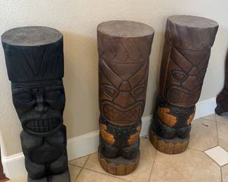 carved tiki totems