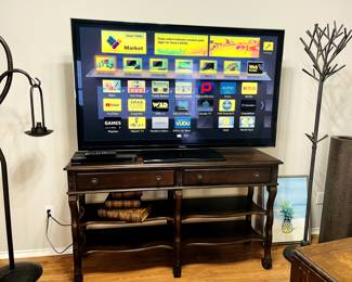 TV and Console.  Hat Stand.