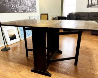 Gate legged antique table.