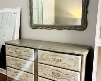 Vintage dresser and matching mirror in excellent condition.