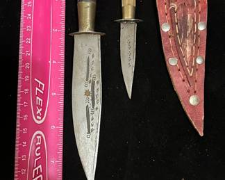 Tusk and bone handled antique knives.