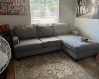 Gray small sectional in great shape.  Rug.  