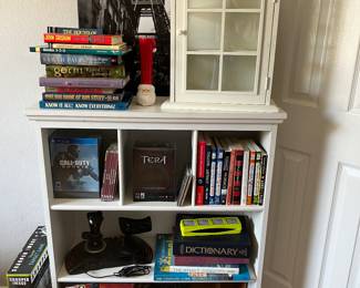 Potterybarn bookshelf.  Games Playstation.  Call of duty and Tera unopened. 