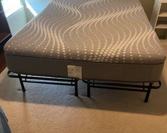 Queen bed with frame. Like new. 