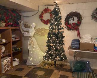 Beautiful lighted angel and really nice thin pre-lit Christmas tree