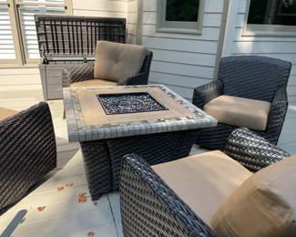 outdoor furniture, gas fire pit, outdoor storage container, tan cushions