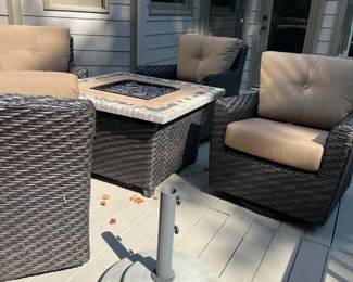 outdoor furniture, gas fire pit, outdoor storage container, tan cushions