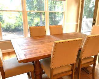 wood dining table with yellow dining chairs
