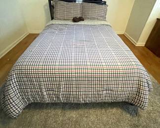 Full size bed and mattress, area rug, bed linens, wall art