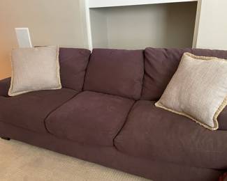 brown fabric couch, throw pillows