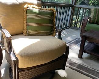 swivel rocking outdoor armchair, throw pillows